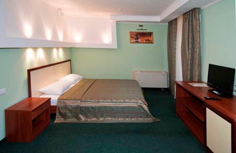 Optima Hotel Deluxe Krivoi Rog Cameră foto